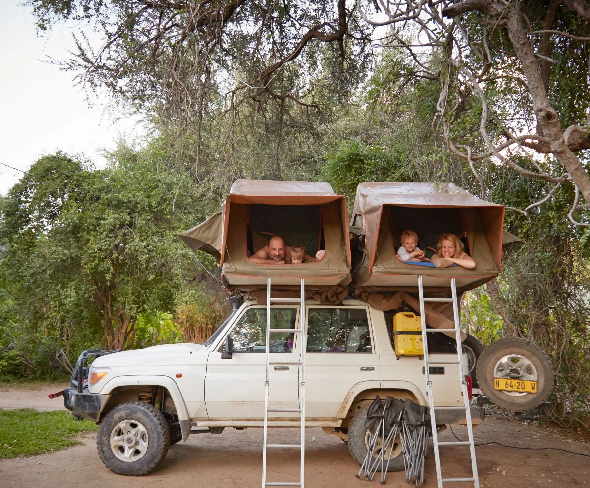 Family in rooftop tents
